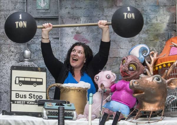 Natalia Cortes (Company Stage Manager) show off a small selection of ecletic props that will be sold off. Photo: John Devlin