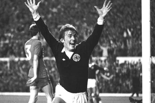 Kenny Dalglish celebrates his goal in the World Cup qualifier against Wales at Anfield in 1977 which sent Scotland to the finals. Picture: SNS.