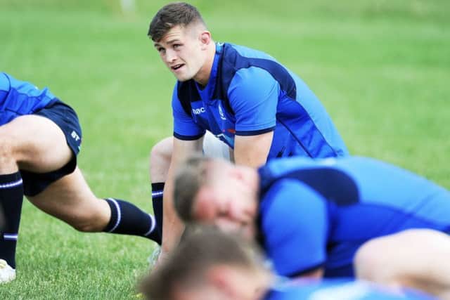 Scotland flanker Magnus Bradbury stretches off during a training session in Edmonton ahead of the Canada match. Picture: Fotosport/David Gibson