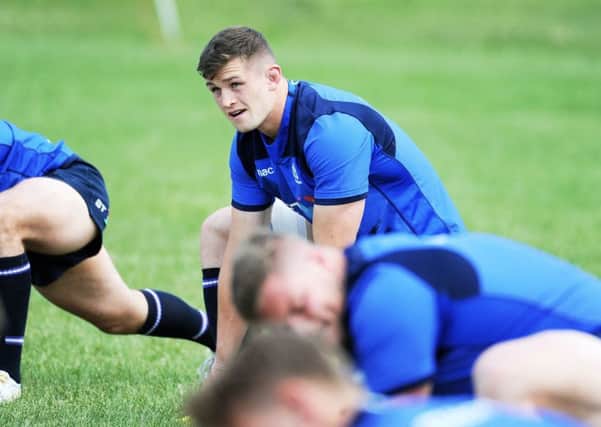 Scotland flanker Magnus Bradbury stretches off during a training session in Edmonton ahead of the Canada match. Picture: Fotosport/David Gibson
