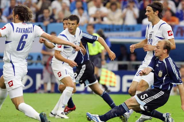 Esteban Cambiasso scores against Serbia & Montenegro at the end of a 25-pass move in 2006. Photograph: Marcelo Endelli/Getty