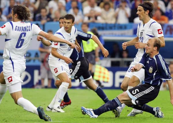 Esteban Cambiasso scores against Serbia & Montenegro at the end of a 25-pass move in 2006. Photograph: Marcelo Endelli/Getty