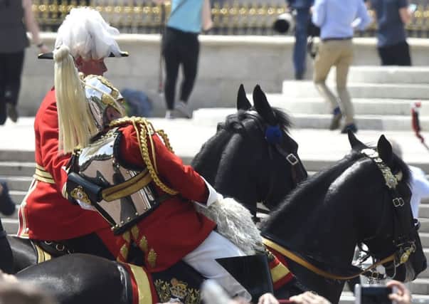 Lord Guthrie, former Chief of Defence Staff, 79, as he fell off his horse in front of Buckingham Palace following the Trooping the Colour ceremony. Picture: PA Wire
