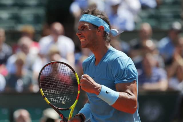 Rafa Nadal clenches his fist on his way to todays final against Dominic Thiem. Picture: AP.