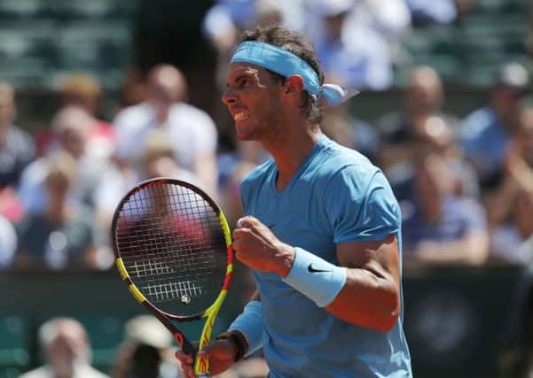 Rafa Nadal clenches his fist on his way to todays final against Dominic Thiem. Picture: AP.