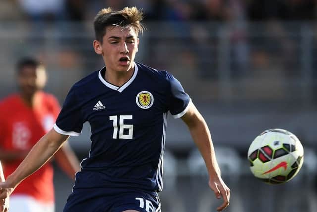 Scotland's midfielder Billy Gilmour (R) vies with England's midfielder Lewis Cook (L) during the Festival International Espoirs - Maurice Revello Tournament Under 21 semi-final football match between Scotland and England at the De Lattre Stadium in Aubagne, southeastern France, on June 6, 2018. / AFP PHOTO / Anne-Christine POUJOULATANNE-CHRISTINE POUJOULAT/AFP/Getty Images