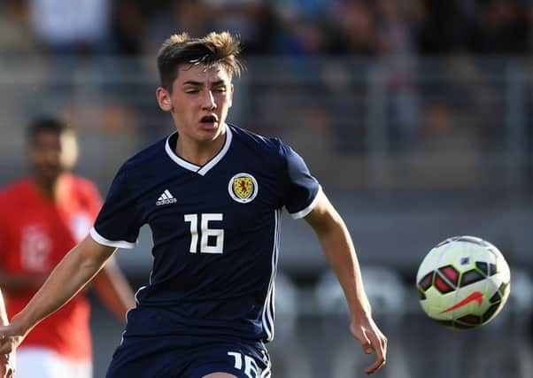 Scotland's midfielder Billy Gilmour (R) vies with England's midfielder Lewis Cook (L) during the  Festival International Espoirs - Maurice Revello Tournament Under 21 semi-final football match between Scotland and England at the De Lattre Stadium in Aubagne, southeastern France, on June 6, 2018. / AFP PHOTO / Anne-Christine POUJOULATANNE-CHRISTINE POUJOULAT/AFP/Getty Images