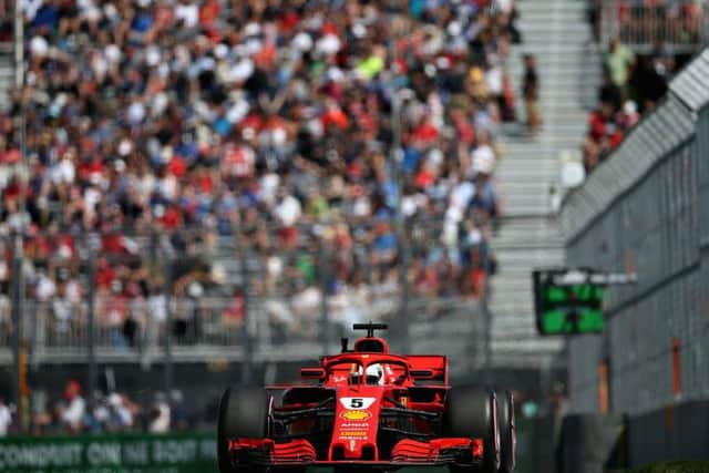 MONTREAL, QC - JUNE 08: Sebastian Vettel of Germany driving the (5) Scuderia Ferrari SF71H on track during practice for the Canadian Formula One Grand Prix at Circuit Gilles Villeneuve on June 8, 2018 in Montreal, Canada.  (Photo by Charles Coates/Getty Images)