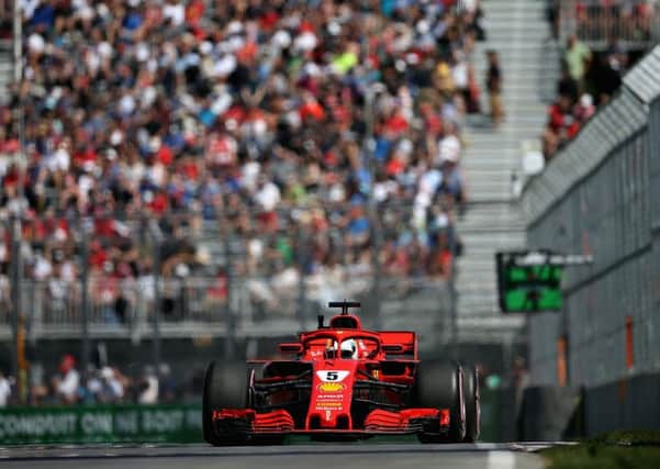MONTREAL, QC - JUNE 08: Sebastian Vettel of Germany driving the (5) Scuderia Ferrari SF71H on track during practice for the Canadian Formula One Grand Prix at Circuit Gilles Villeneuve on June 8, 2018 in Montreal, Canada.  (Photo by Charles Coates/Getty Images)