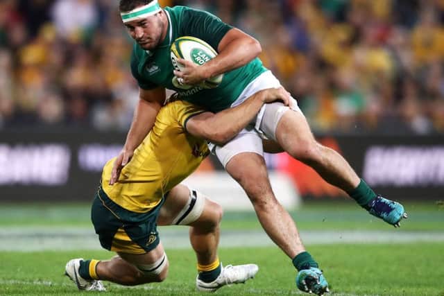 Rob Herring of Ireland is tackled during their defeat by Australia in Brisbane. Picture: Getty.