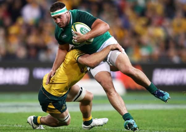 Rob Herring of Ireland is tackled during their defeat by Australia in Brisbane. Picture: Getty.