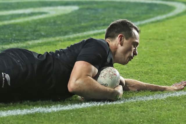 Ben Smith of New Zealand touches down during their victory over France in Auckland. Picture: AP.