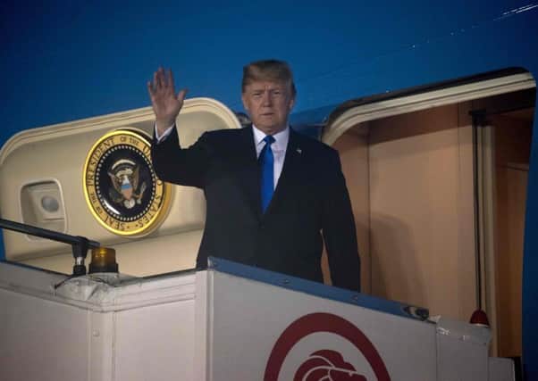 US President Donald Trump lands in Singapore. Picture: AFP