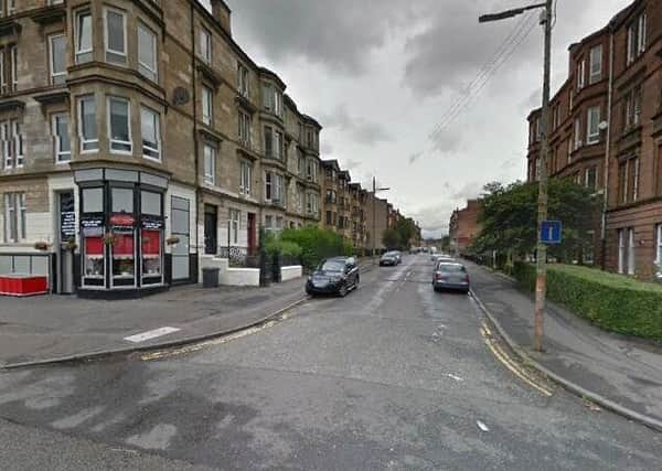 The three men tried to access the flat in Meadow Park Street, Dennistoun. Picture: Google