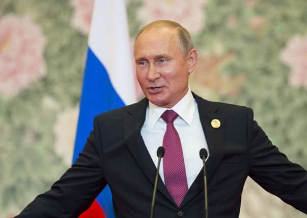 Vladimir Putin: Critical of  Trumps Iran deal decision. Picture: AP Photo/Alexander Zemlianichenko