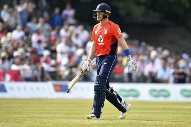England's Eoin Morgan walks off the field at the Grange. Picture: SNS.