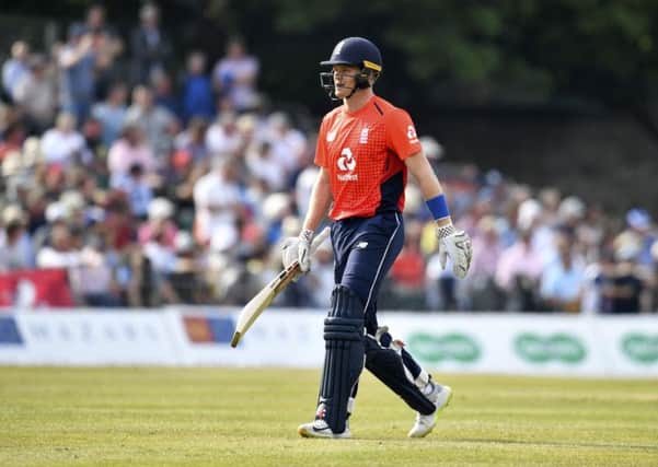England's Eoin Morgan walks off the field at the Grange. Picture: SNS.