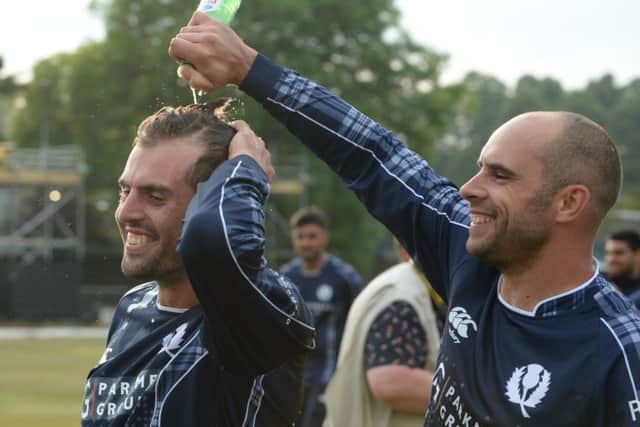 Calum MacLeod, left, and Kyle Coetzer celebrate on Sunday. Picture: Getty.