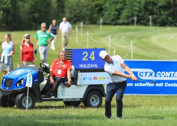 Jeppe Pape Huldahl of Denmark plays his third shot on the 11th hole alongside the 'shot clock' during day three of the Shot Clock Masters at Diamond Country Club in Atzenbrugg, Austria. Picture: Matthew Lewis/Getty Images
