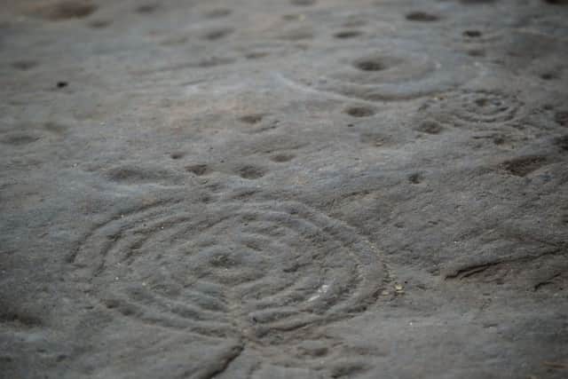 Details from the cup and ring marks on the Cochno Stone at Faifley. PIC: John Devlin/TSPL.