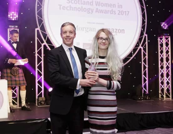 Graeme Smith of Amazon with Elyssa Ross, winner of Rising Star in 2017. Picture: Contributed