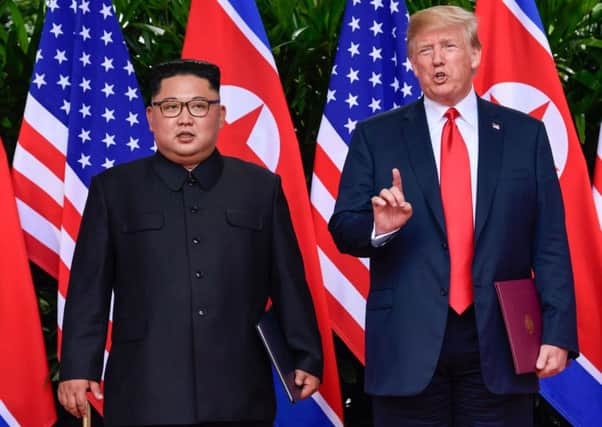 US President Donald Trump makes a statement before saying goodbye to North Korea leader Kim Jong Un.Picture: AFP PHOTO / POOL / Susan Walsh