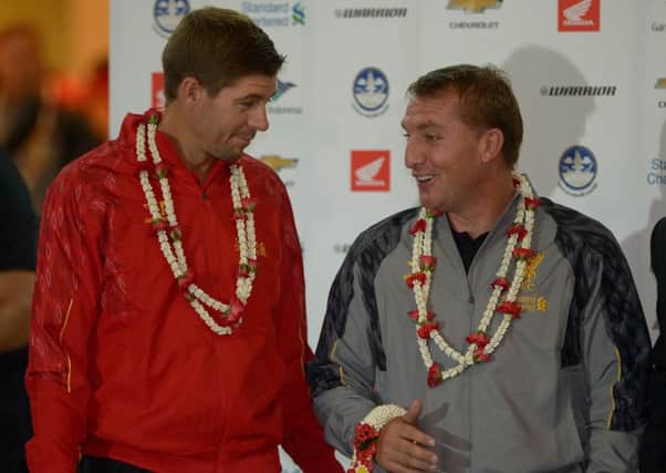 Steven Gerrard with Brendan Rodgers during their time at Liverpool. Picture: PORNCHAI KITTIWONGSAKUL/AFP/Getty