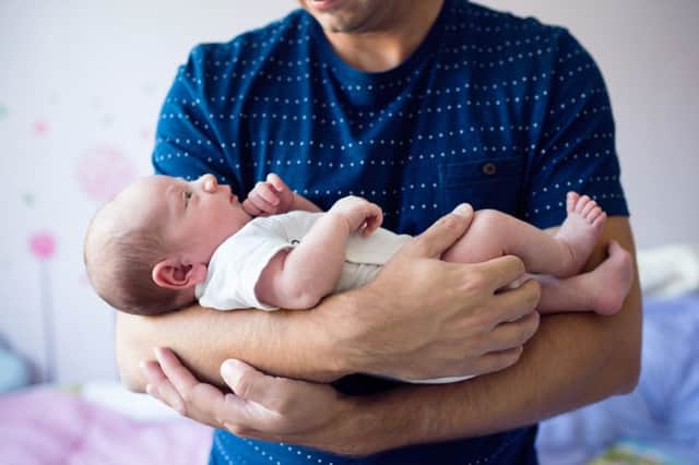 Fewer than 20 per cent of fathers in Scotland take more than two weeks leave after their partner has given birth, research has found