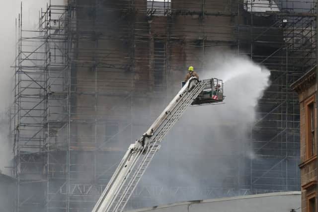 Firefighters at the historic Mackintosh Building in Glasgow. Pictute: Andrew Milligan/PA Wire