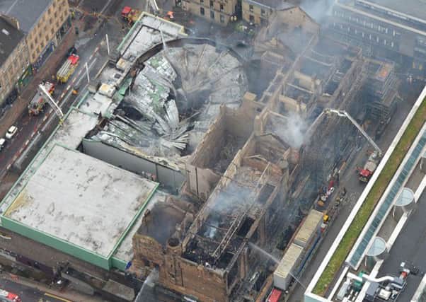 Work is ongoing to determine the structural integrity of the Mackintosh Building. Picture: Police Scotland