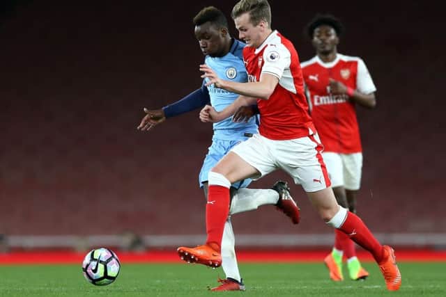 Thierry Ambrose challenges Ben Sheaf during a Premier League 2 match in March 2017. Picture: Getty Images