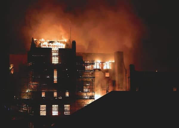 The fire broke out in the Mackintosh Building at 11.19pm on Friday. Picture: John Devlin