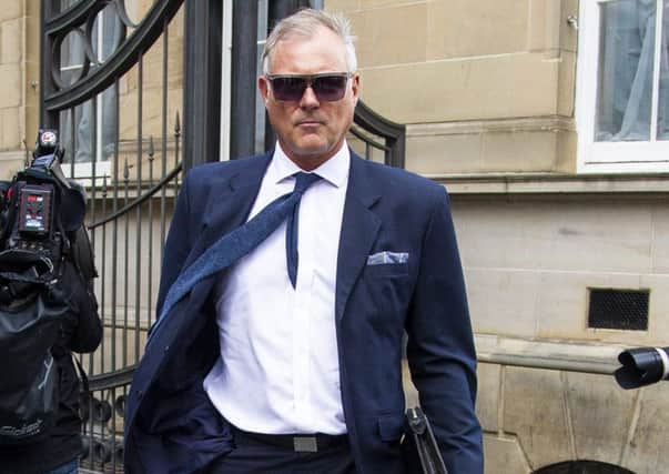 Former Blue Peter presenter John Leslie's arrives at Edinburgh Sheriff Court over an alleged sexual assault. Picture: SWNS