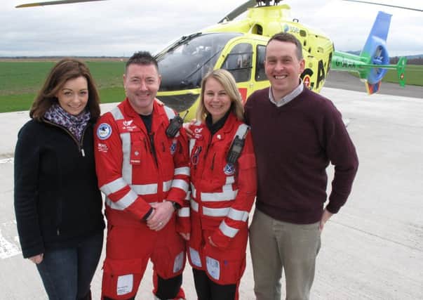 (L-R) Alison and Paul Wilson with paramedics Craig MacDonal and Wendy Jubb. Picture: SCAA