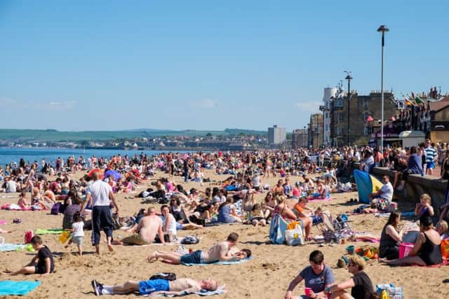 Beaches (like this in Edinburgh's Portabello) could be busy as people embrace the heatwave. Picture: TSPL