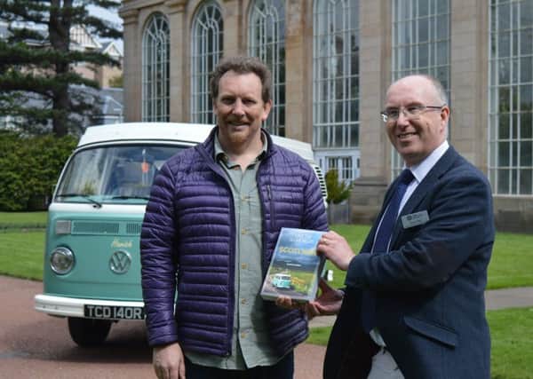 Kevin Reid, Director of Horticulture at the Royal Botanic Garden Edinburgh with author Martin Dorey and Hamish the camper van