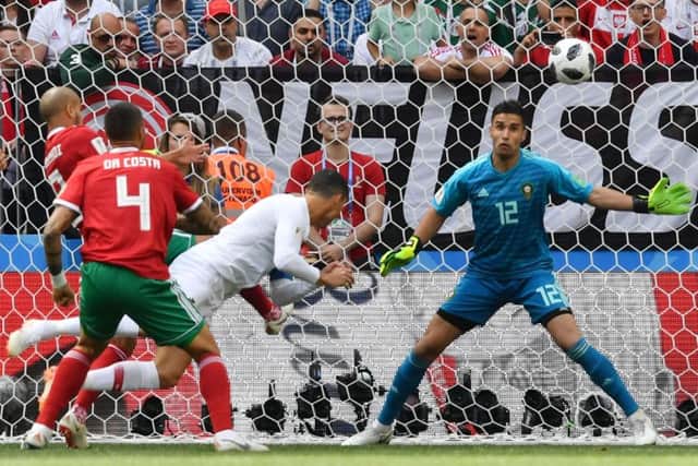Cristiano Ronaldo heads the winner for Portugal against Morocco. Picture: Yuri Cortez/AFP