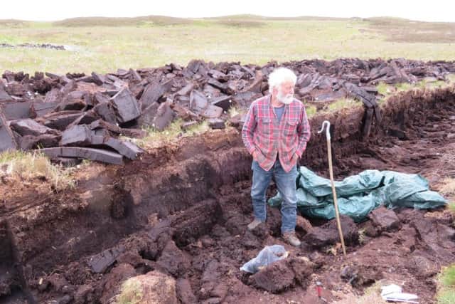 Crofter Duncan MacKay at his peak bank where the animal remains were found. PIC: Contributed.
