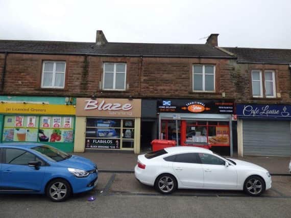 The property is situated above some shops in Halfway, Cumbuslang. Picture: Rightmove
