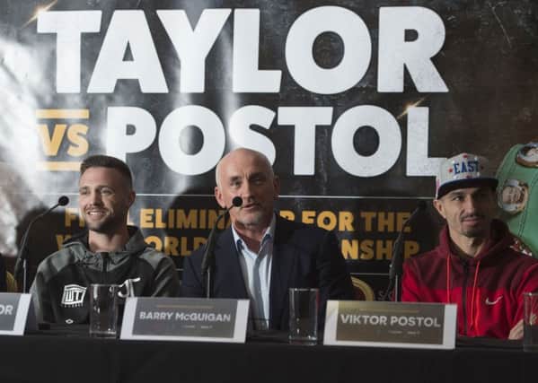 Josh Taylor, left, with promoter Barry McGuigan and Viktor Postol. Picture: Craig Foy/SNS