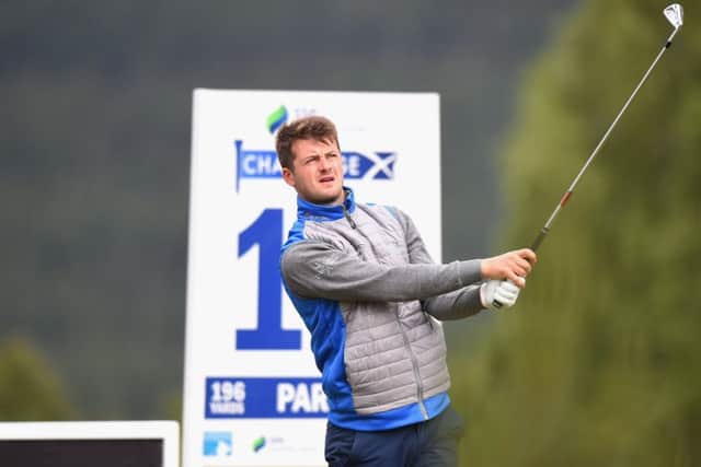 David Law tees off at the 10th at Macdonald Spey Valley in Aviemore on his way to a five-under 66. Picture: Getty Images