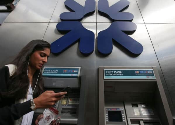 Phone-banking has reduced the need for cash machines (Picture: AFP/Getty)
