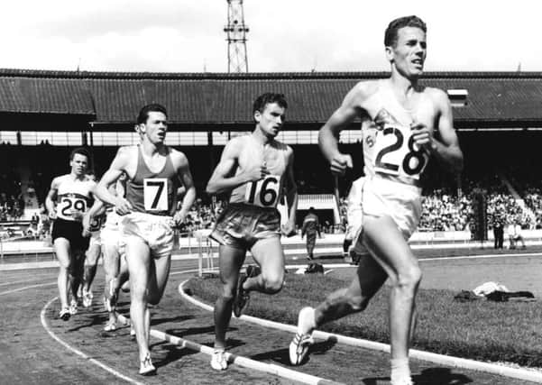 Hungarian-American athlete Laszlo Tabori (28) leads the field, followed by Michel Jazy (16) during the one mile race, at the Amateur Athletics Championships at White City stadium in London, 1960. (Photo by Ed Lacey/Popperfoto/Getty Images)