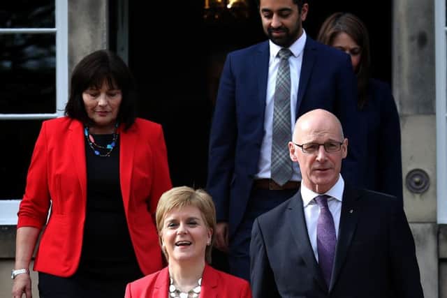 First Minister Nicola Sturgeon and  her deputy, John Swinney, with Jeane Freeman and Humza Yousaf (Picture: PA)