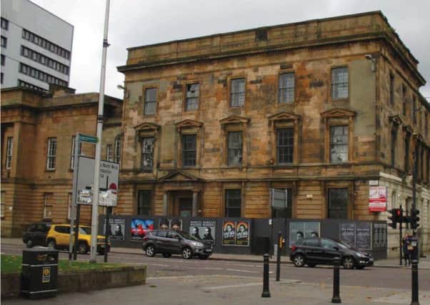 The mid-19th century tenement on Clyde Street in Glasgow city centre was Grade B listed but still demolished after years of neglect. The neighbouring Custom House will be preserved. Picture: Glasgow City Council