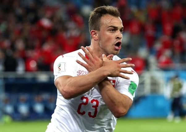 Xherdan Shaqiri celebrates his late strike for Switzerland. Picture: Getty.