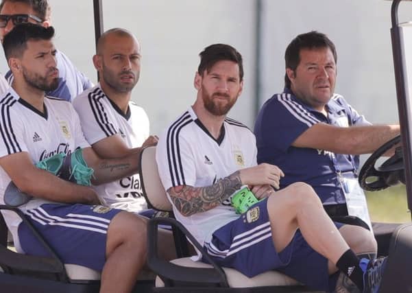 Lionel Messi, second from right, Sergio Aguero, left, and Javier Mascherano arrive for a training session in Bronnitsy. Picture: AP Photo