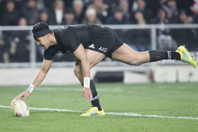 New Zealand's Rieko Ioane scores a try against France. Picture: AP.