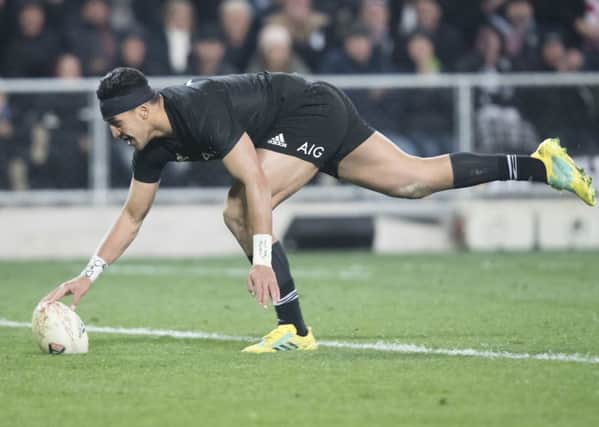 New Zealand's Rieko Ioane scores a try against France. Picture: AP.