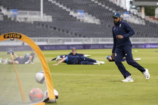 England wicketkeeper Adil Rashid shows off his football skills during a nets session at Old Trafford. Picture: Getty.